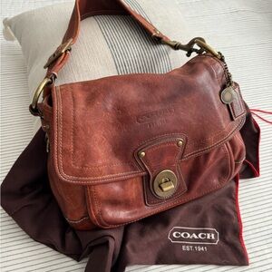 Brown Leather Coach shoulder bag and duster